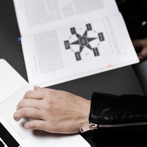 Illustration showing a person working with a laptop